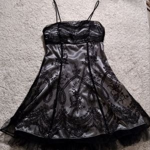 Beautiful black and silver dress with florals. Size 5/6.